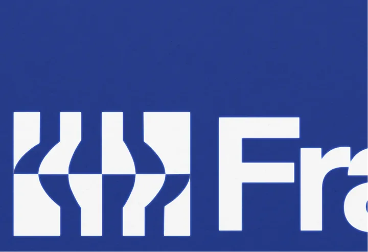 A close crop of the white Framework symbol and wordmark fills a deep blue background.